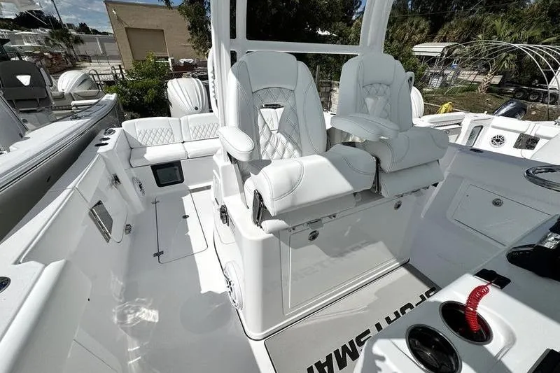 Slide: The Image of 2026 Sportsman Heritage 321 Center Console with luxurious white seating and modern design. - 20