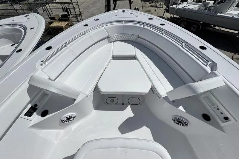 Slide: The Image of 2026 Sportsman Heritage 321 Center Console boat with spacious seating and modern design. - 6