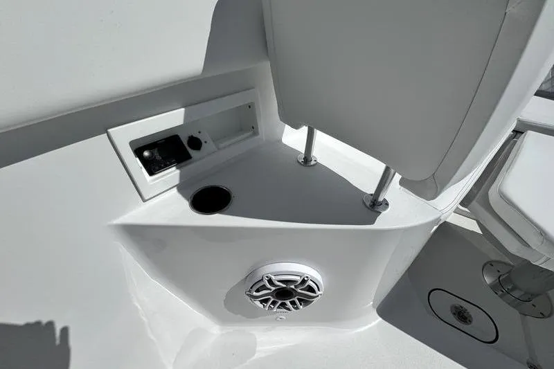 Slide: The Image of 2026 Sportsman Heritage 321 Center Console interior with speaker and seating detail. - 7