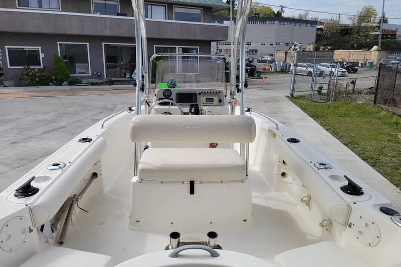 Slide: The Image of 2010 Trophy 1703 Center Console boat interior with seating and control panel. - 11