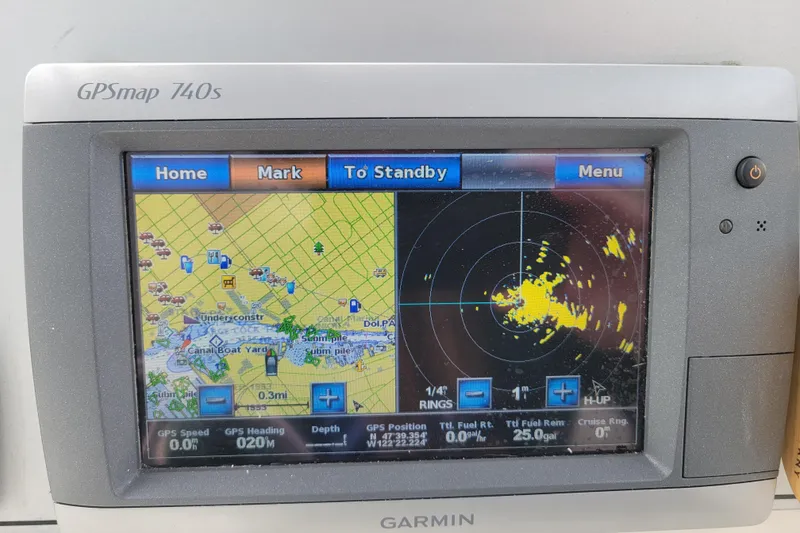 Slide: The Image of Garmin GPSmap 740s displaying navigation and radar on a 2010 Trophy 1703 Center Console. - 16