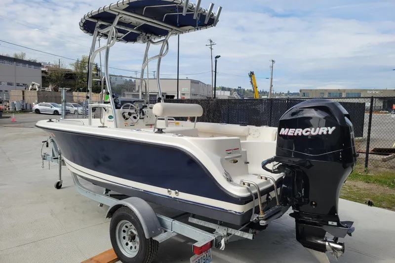 Slide: The Image of 2010 Trophy 1703 Center Console boat with Mercury engine on trailer. - 2