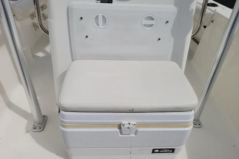 Slide: The Image of 2010 Trophy 1703 Center Console boat seat with storage compartment. - 21