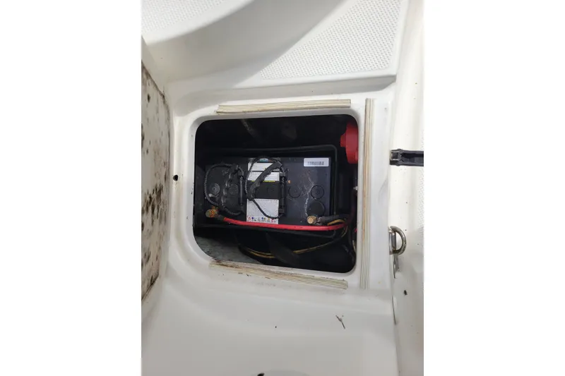 Slide: The Image of Battery compartment of a 2010 Trophy 1703 Center Console boat. - 24