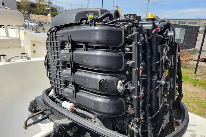 Slide: The Image of 2010 Trophy 1703 Center Console boat engine, detailed view of motor components. - 32