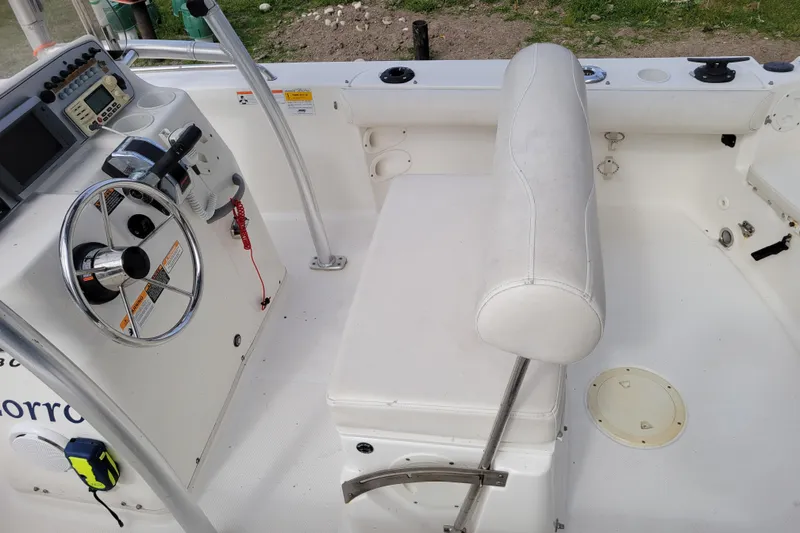 Slide: The Image of 2010 Trophy 1703 Center Console boat interior with steering wheel and seating. - 9