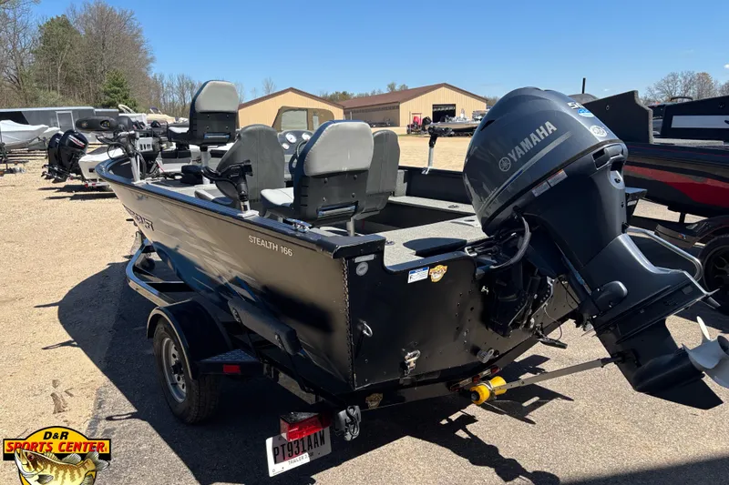 Slide: The Image of 2019 Starcraft Stealth 166 SC boat with Yamaha outboard motor in outdoor setting. - 20