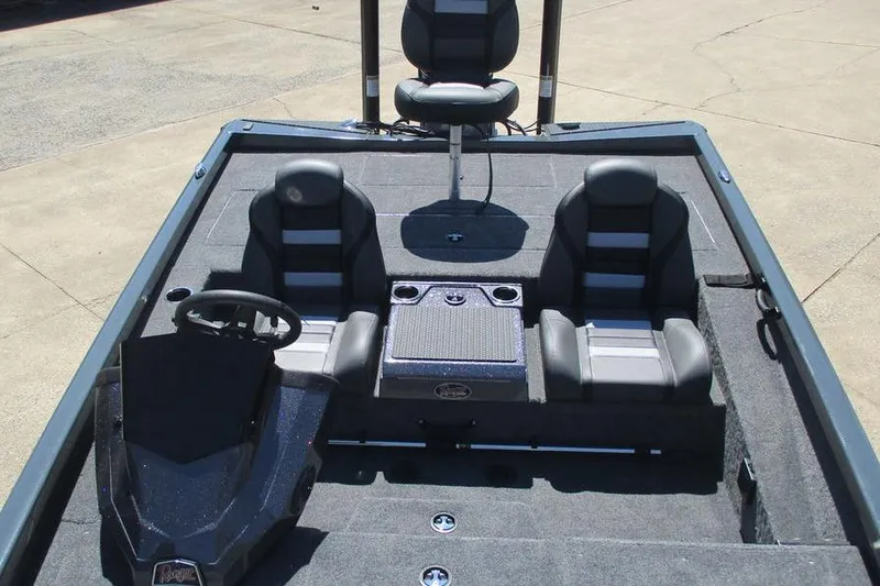 Slide: The Image of 2026 Ranger RT188P boat interior with three seats and steering console. - 10