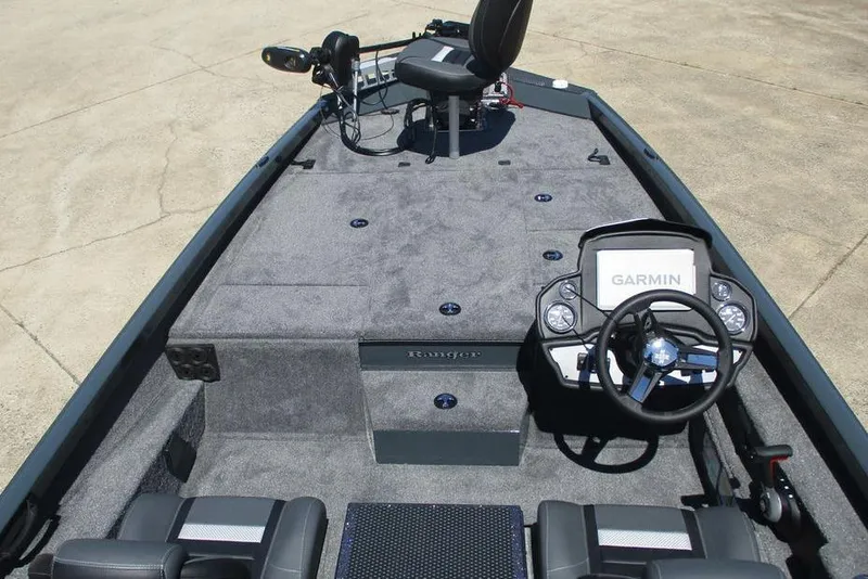 Slide: The Image of 2026 Ranger RT188P boat interior with Garmin navigation system and seating. - 6