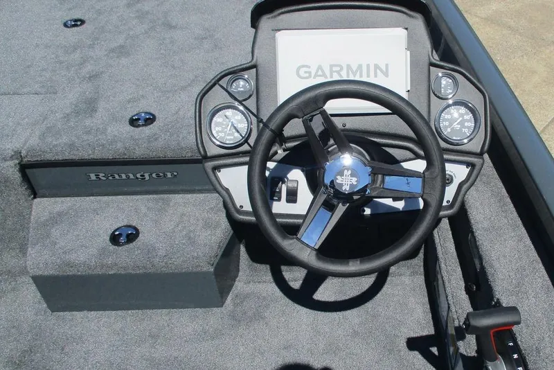 Slide: The Image of 2026 Ranger RT188P boat dashboard with Garmin display and steering wheel. - 9