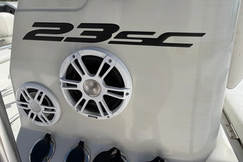 Slide: The Image of Epic 23 Sport Console 2017 boat with Fusion speakers and sleek design. - 18