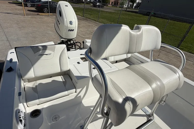 Slide: The Image of 2017 Epic 23 Sport Console boat with Suzuki 200 engine and white seating. - 20
