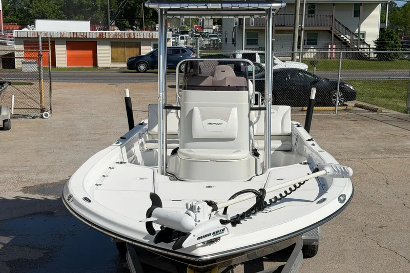 Slide: The Image of 2017 Epic 23 Sport Console boat on trailer in a parking lot. - 3