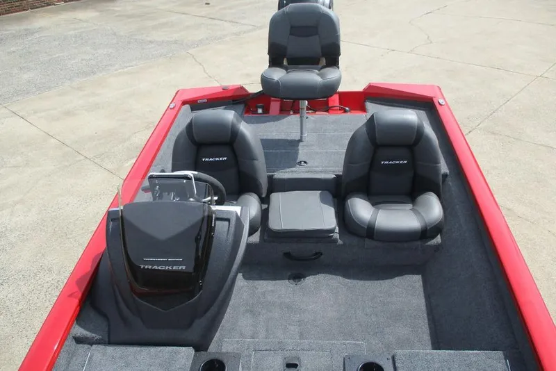Slide: The Image of 2026 Tracker Pro Team 175 boat interior with gray seating and red accents. - 7
