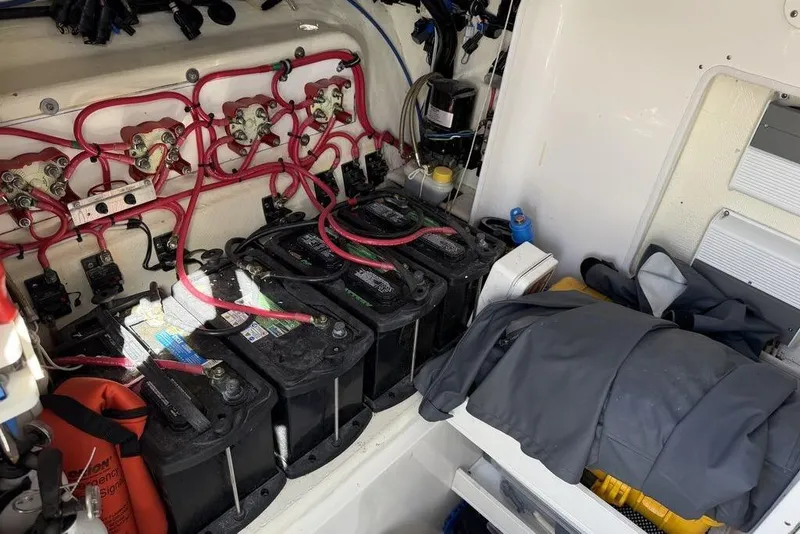 Slide: The Image of Electrical system and batteries inside a 2004 Fountain Bluewater 34 CC boat. - 34