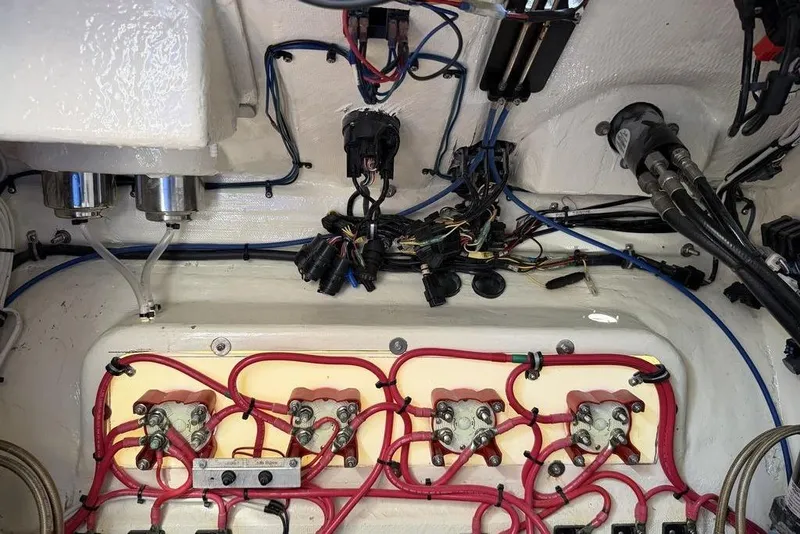 Slide: The Image of Electrical wiring and components inside a 2004 Fountain Bluewater 34 CC boat. - 39