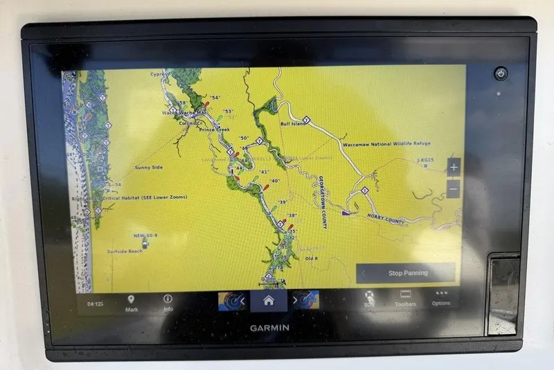 Slide: The Image of Garmin GPS displaying a nautical map on a 2004 Fountain Bluewater 34 CC boat. - 54
