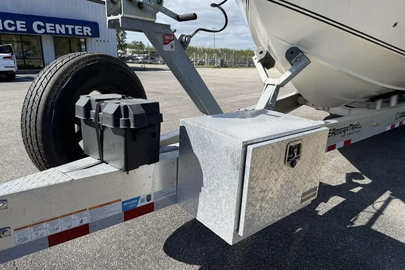 Slide: The Image of Trailer with 2004 Fountain Bluewater 34 CC boat at service center. - 55