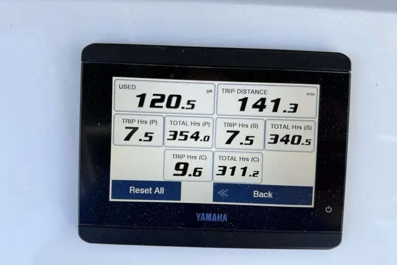 Slide: The Image of Yamaha display showing fuel usage and trip data for 2004 Fountain Bluewater 34 CC. - 67