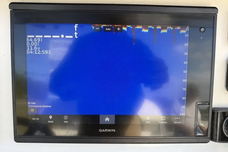 Slide: The Image of Garmin marine display on 2004 Fountain Bluewater 34 CC showing sonar and temperature data. - 76