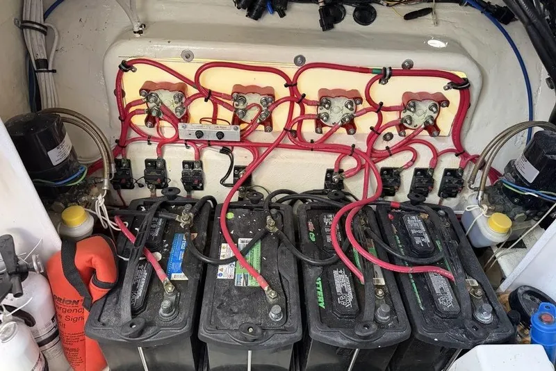 Slide: The Image of Electrical system of a 2004 Fountain Bluewater 34 CC boat with batteries and wiring. - 77