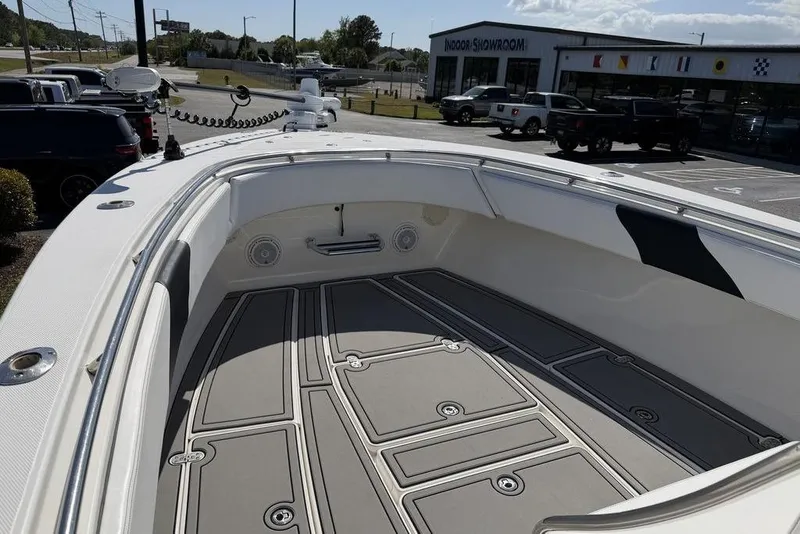 Slide: The Image of 2004 Fountain Bluewater 34 CC boat interior with spacious deck in showroom parking lot. - 9