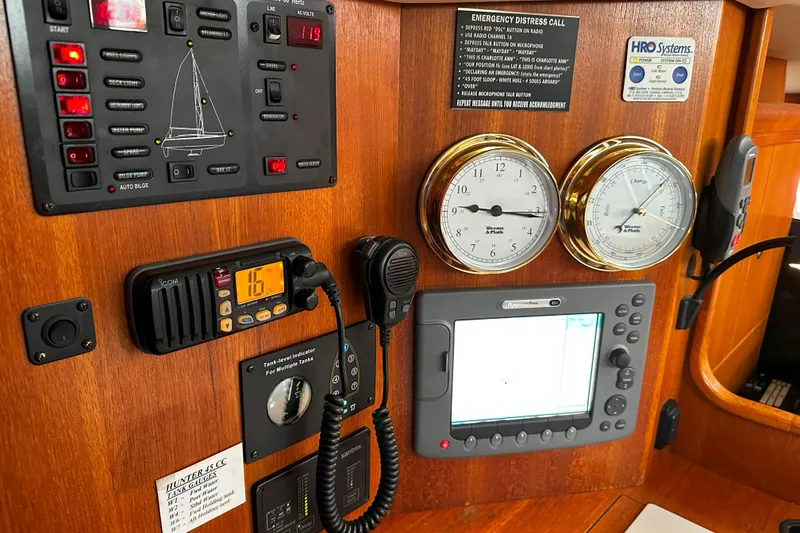 Slide: The Image of Control panel of a 2006 Hunter 45 CC sailboat with navigation instruments. - 40