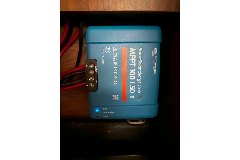 Slide: The Image of Victron Energy MPPT 100/50 SmartSolar charge controller in Hunter 45 CC, 2006 model. - 45