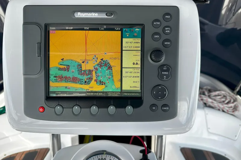 Slide: The Image of Raymarine navigation system on 2006 Hunter 45 CC sailboat, displaying nautical chart. - 57