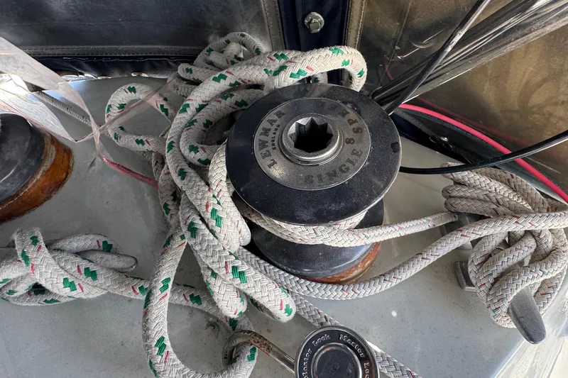 Slide: The Image of Winch and ropes on a 1989 Ericson Sloop sailboat deck. - 19