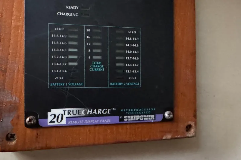Slide: The Image of TrueCharge 20 remote display panel on 1989 Ericson Sloop, showing battery voltage levels. - 30
