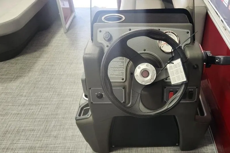 Slide: The Image of Steering console of 2026 Sun Tracker Party Barge 16 DLX pontoon boat. - 3