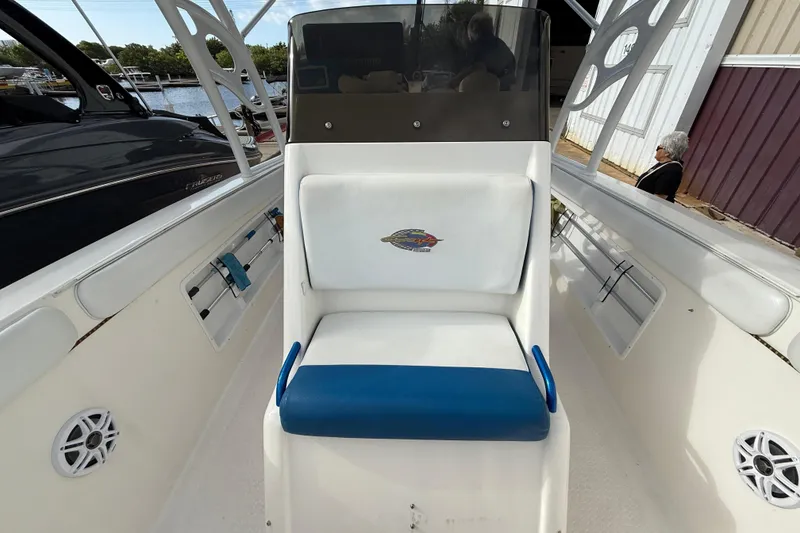 Slide: The Image of 2006 Concept 30 PF Open Fish boat interior with white and blue seating. - 23