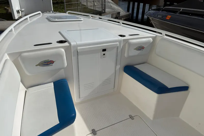 Slide: The Image of 2006 Concept 30 PF Open Fish boat interior with white and blue seating. - 28
