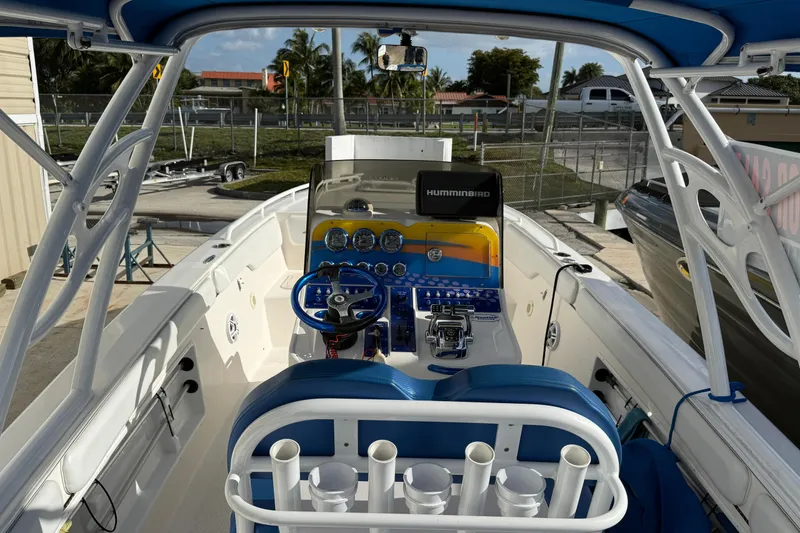 Slide: The Image of 2006 Concept 30 PF Open Fish boat interior with blue accents and navigation equipment. - 7