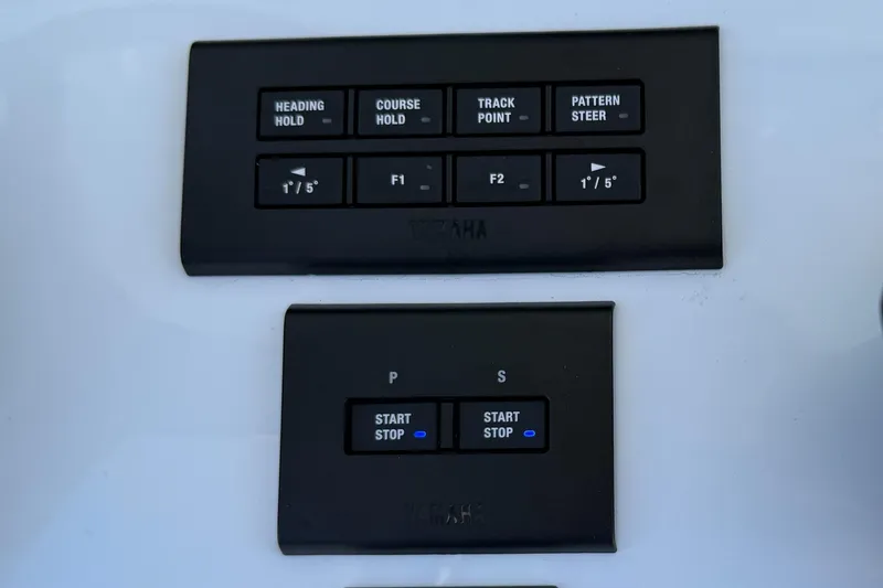 Slide: The Image of Control panel of 2025 Sea Hunt Ultra 275 SE boat with navigation buttons. - 25