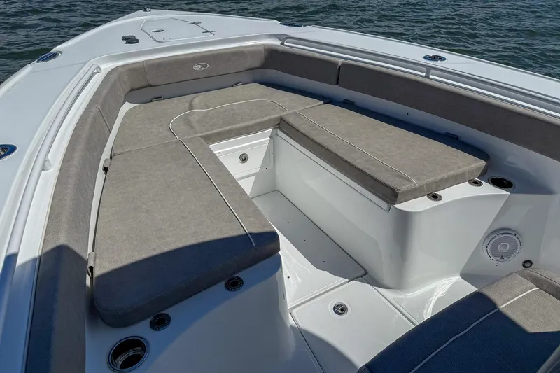Slide: The Image of 2025 Sea Hunt Ultra 275 SE boat interior with cushioned seating and sleek design. - 37