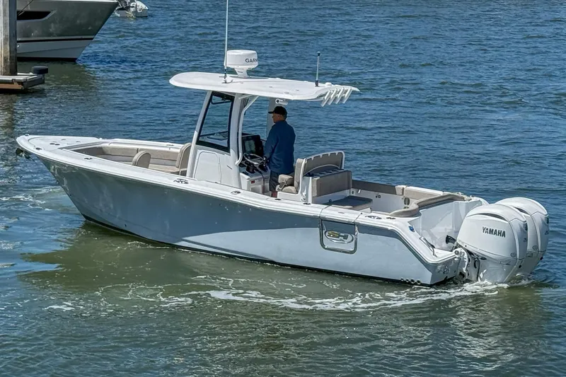 Slide: The Image of 2025 Sea Hunt Ultra 275 SE boat cruising on water with Yamaha engines. - 7