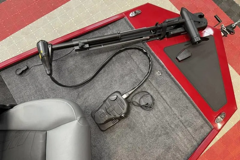 Slide: The Image of 2026 Tracker Bass Tracker Classic XL boat interior with trolling motor and foot pedal. - 10