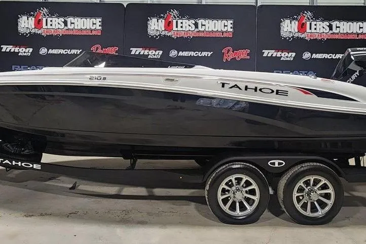 The Image of 2026 Tahoe 210 S boat on trailer at Anglers Choice event. - 1