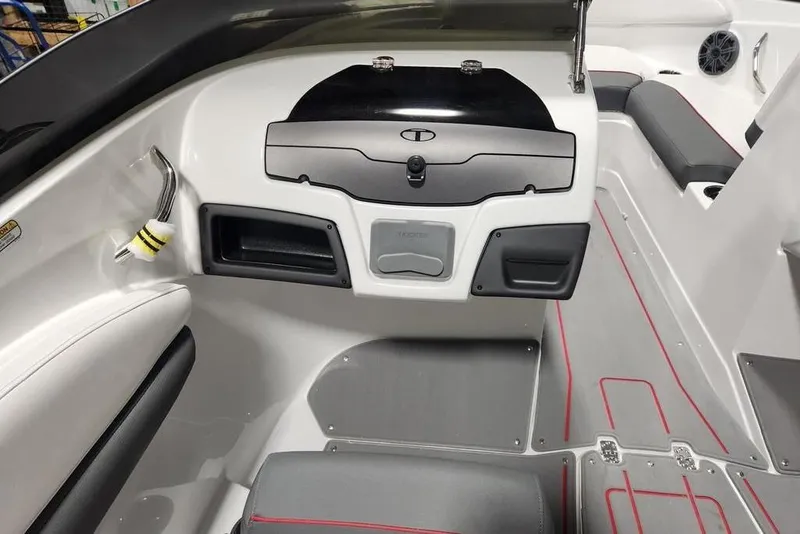 Slide: The Image of Interior of 2026 Tahoe 210 S boat, featuring sleek seating and modern dashboard design. - 10