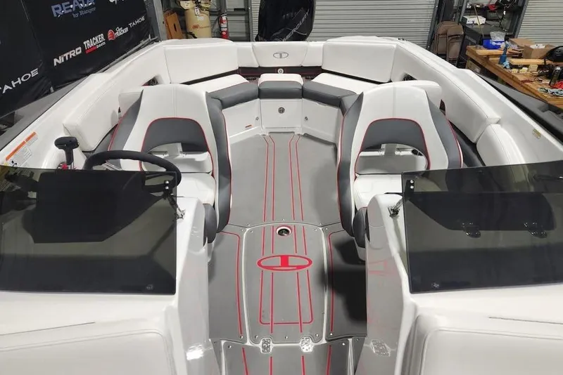 Slide: The Image of 2026 Tahoe 210 S boat interior with sleek seating and modern design. - 7