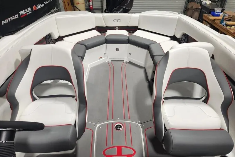 Slide: The Image of Interior of 2026 Tahoe 210 S boat with modern seating and sleek design. - 8