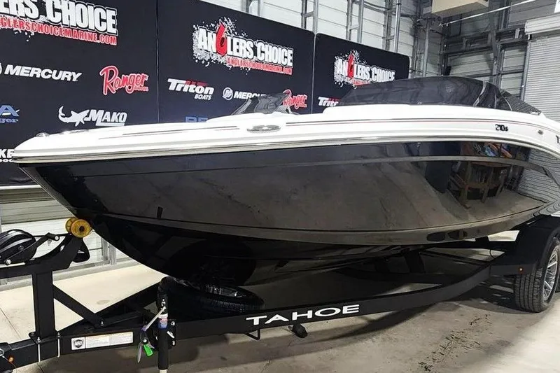 Slide: The Image of 2026 Tahoe 210 S boat on trailer at Anglers Choice showroom. - 9
