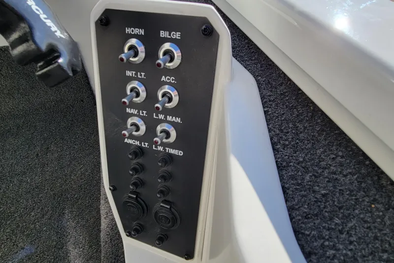 Slide: The Image of Dashboard of a 2019 Vexus AVX1980 boat featuring a Helix 9 display and RPM gauge. - 11