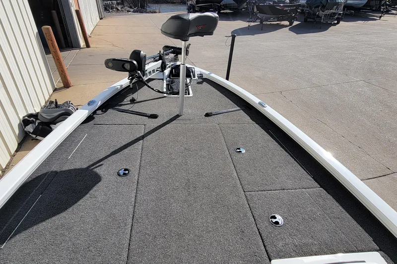 Slide: The Image of Interior view of a 2019 Vexus AVX1980 boat showing seating and storage compartments. - 16