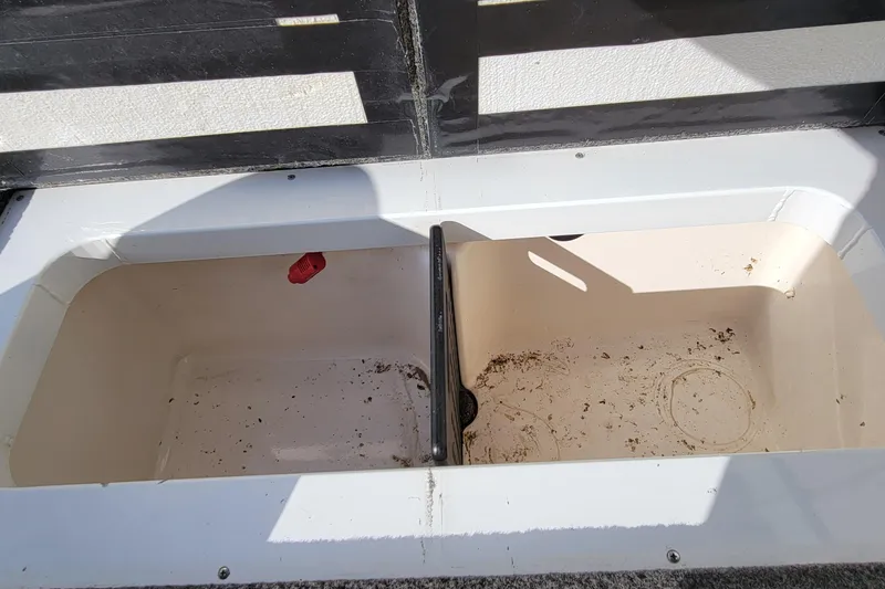 Slide: The Image of 2019 Vexus AVX1980 boat control panel with throttle lever and seating capacity label. - 20