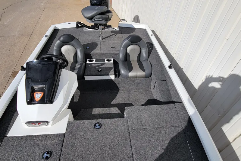Slide: The Image of 2019 Vexus AVX1980 boat storage compartment with battery and cables. - 24