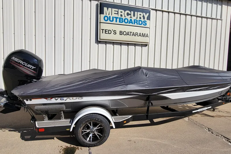 Slide: The Image of Covered 2019 Vexus AVX1980 boat on trailer at Ted's Boatarama, Mercury Outboards sign visible. - 4