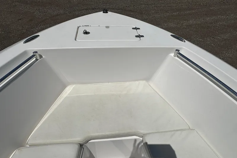Slide: The Image of Bow area of 2023 LFG 22 CC boat with storage hatch and seating. - 12